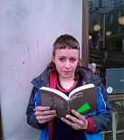 Reading How To Change The World in Stokes Croft